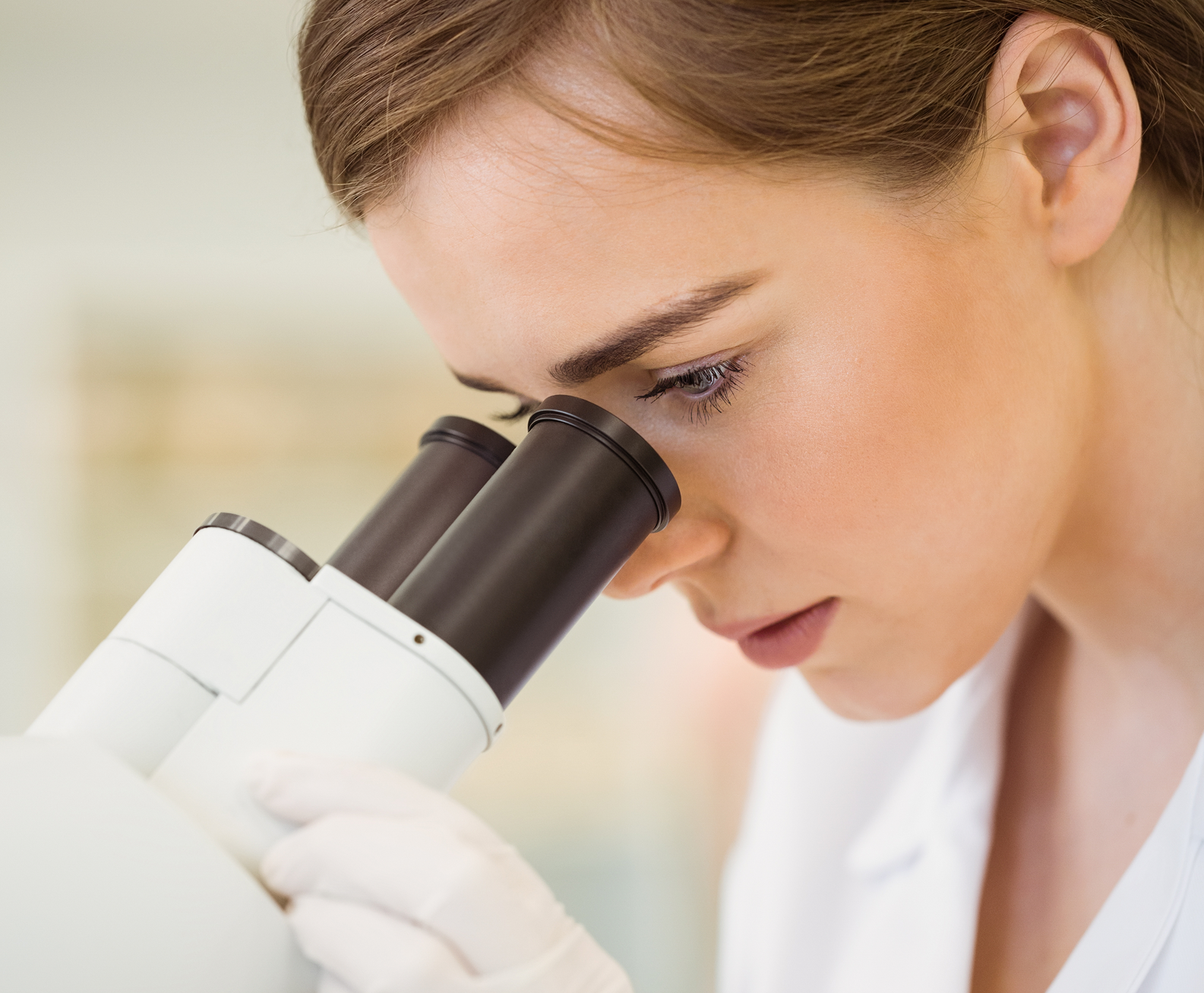 young-scientist-working-with-microscope 1